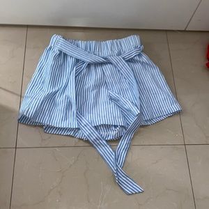 Blue and white striped shorts with tie.